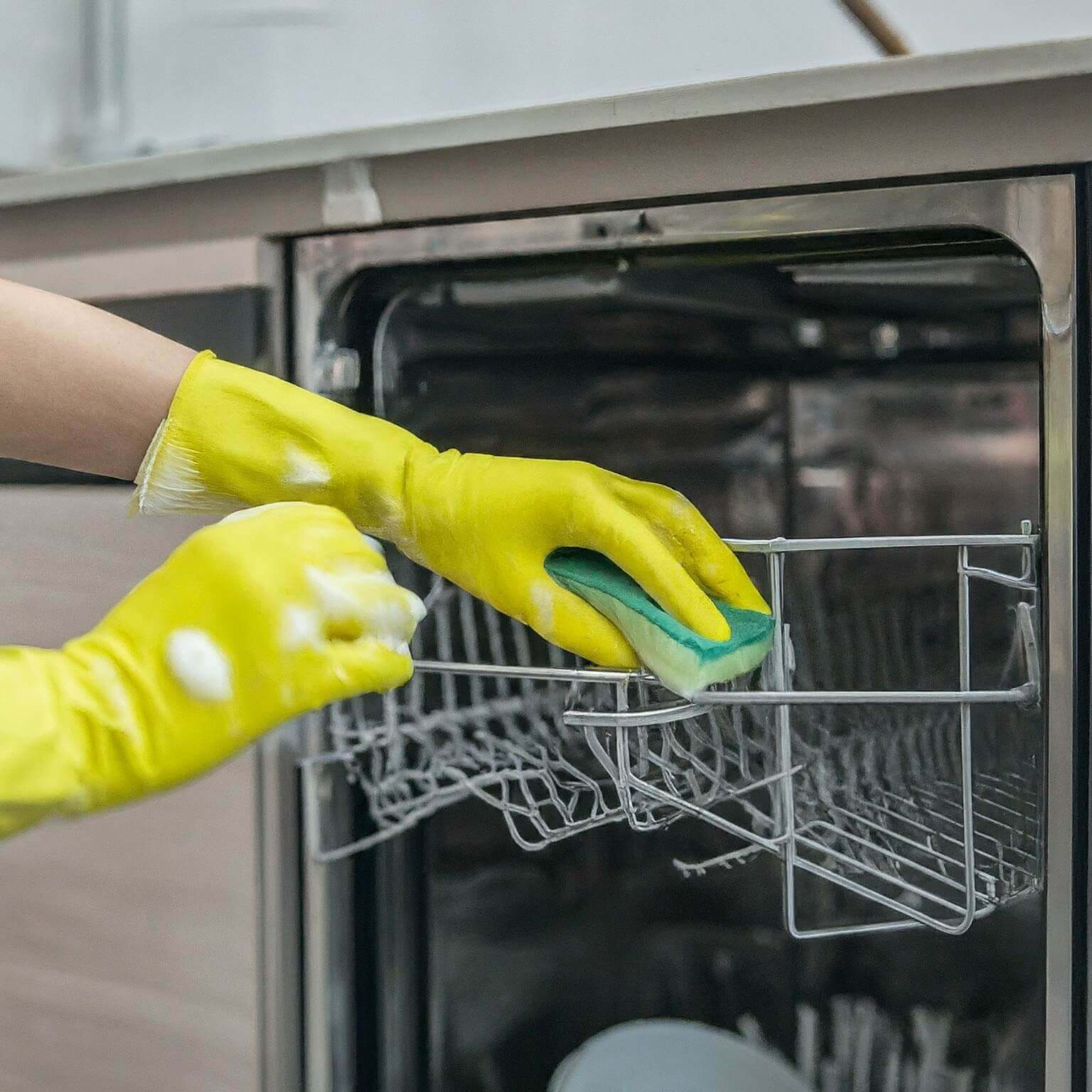 an image representing the dishwasher being cleaned