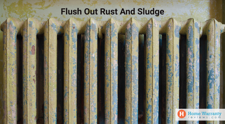 Flush out rust and sludge